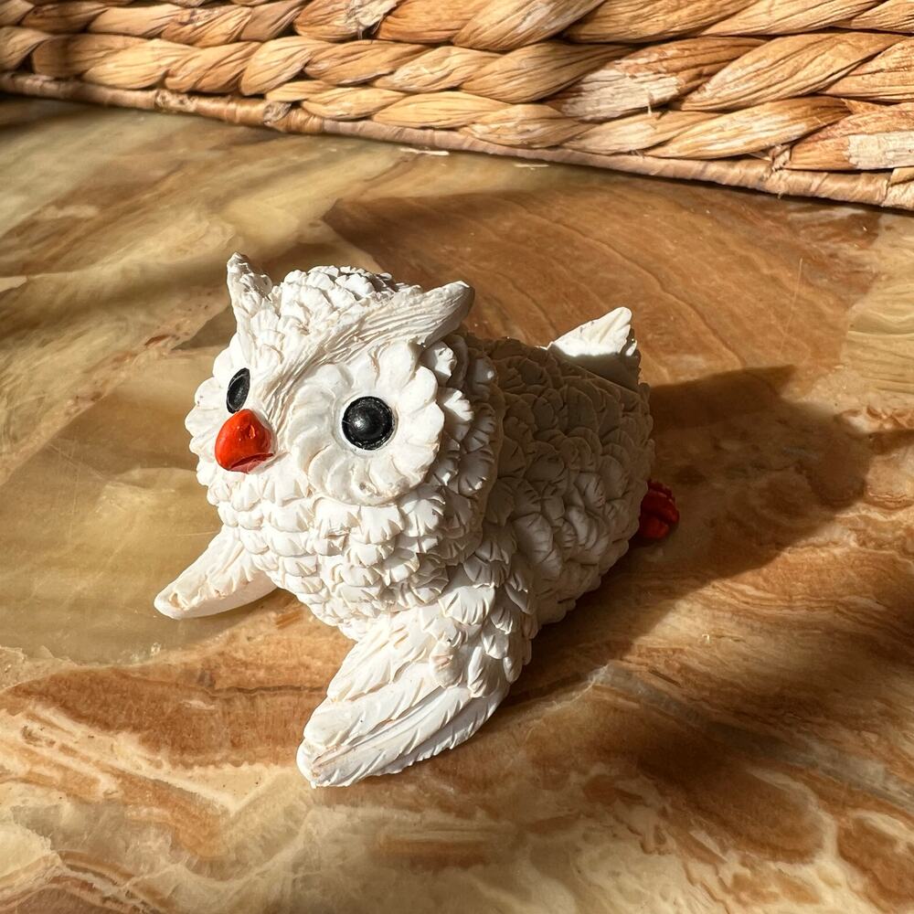Small white owl figure